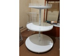 Стелаж острівний з круглими полицями